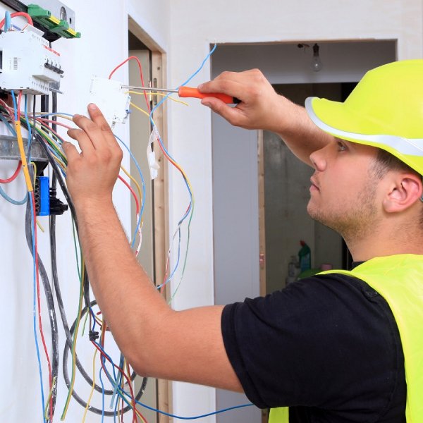 Electrician fixing power outage in Brisbane